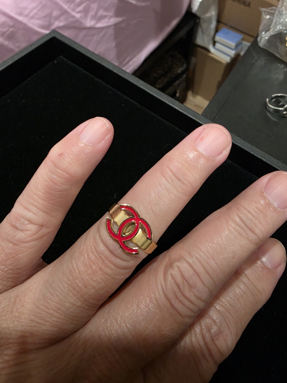 Gold-Tone Ring with Red Interlocking Logo - Women Jewelry